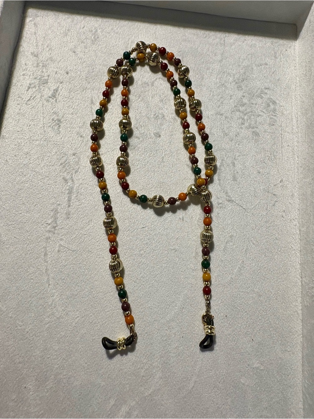 Beaded sunglasseses holder